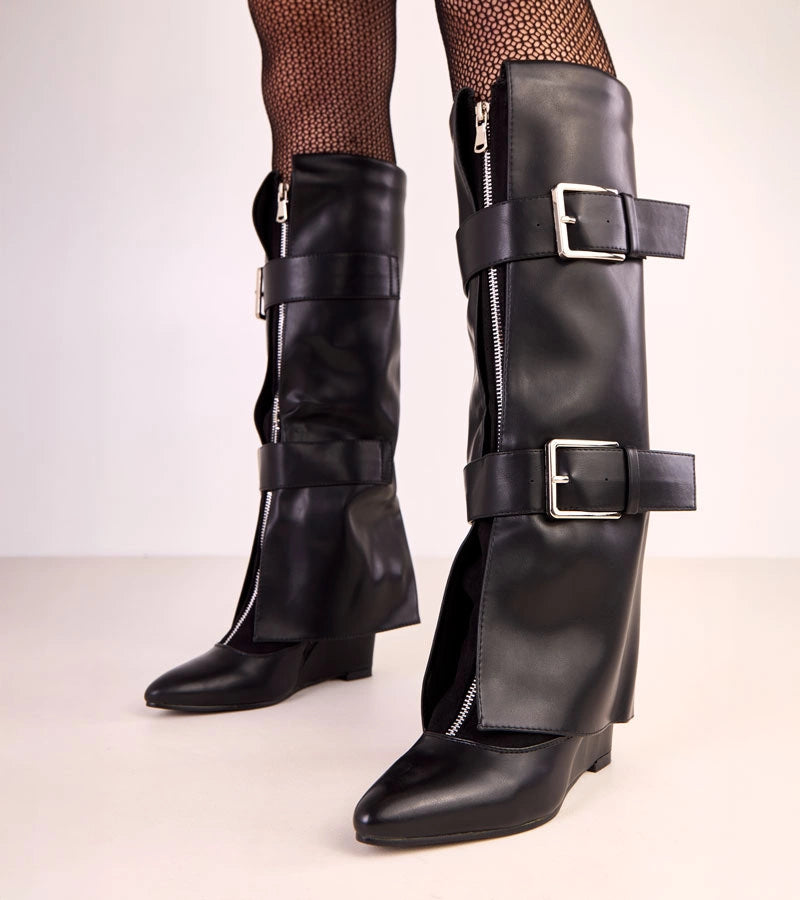 Black wedge boots with decorative buckles by Toadera